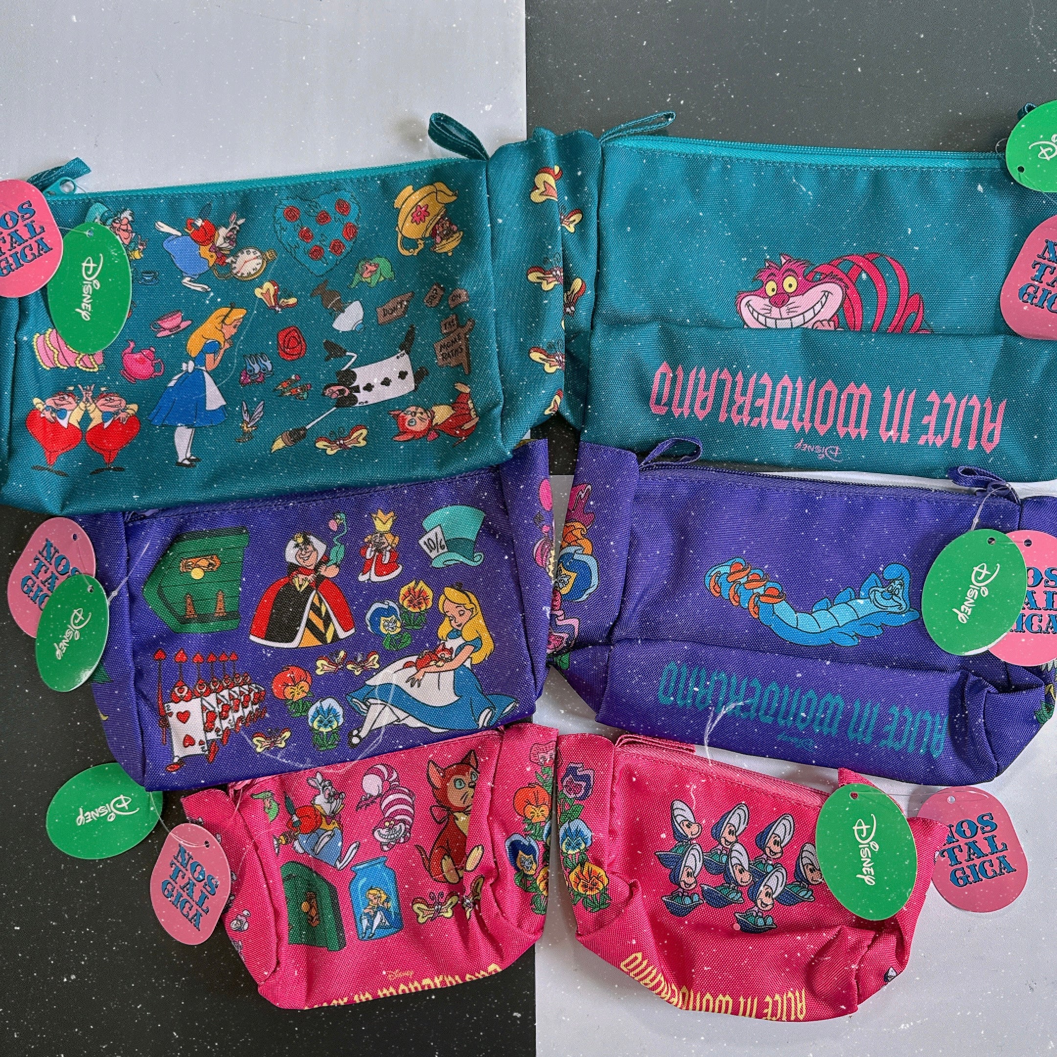 Available now in 3 sizes NOSTALGICA Alice in Wonderland multi-purpose pouch